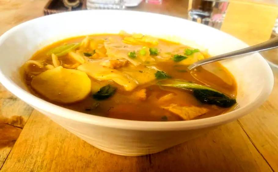 Bowl of Himalayan noodle soup with herbs and spices – thenduk shyakpa Sherpa soup in Toronto