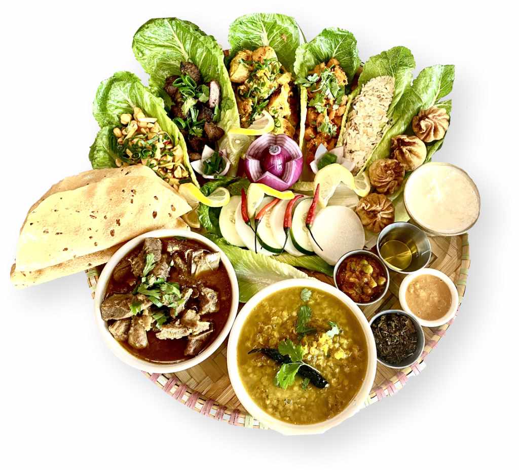 Platter of assorted Himalayan and Nepalese dishes with spices ginger garlic cumin turmeric herbs in Toronto